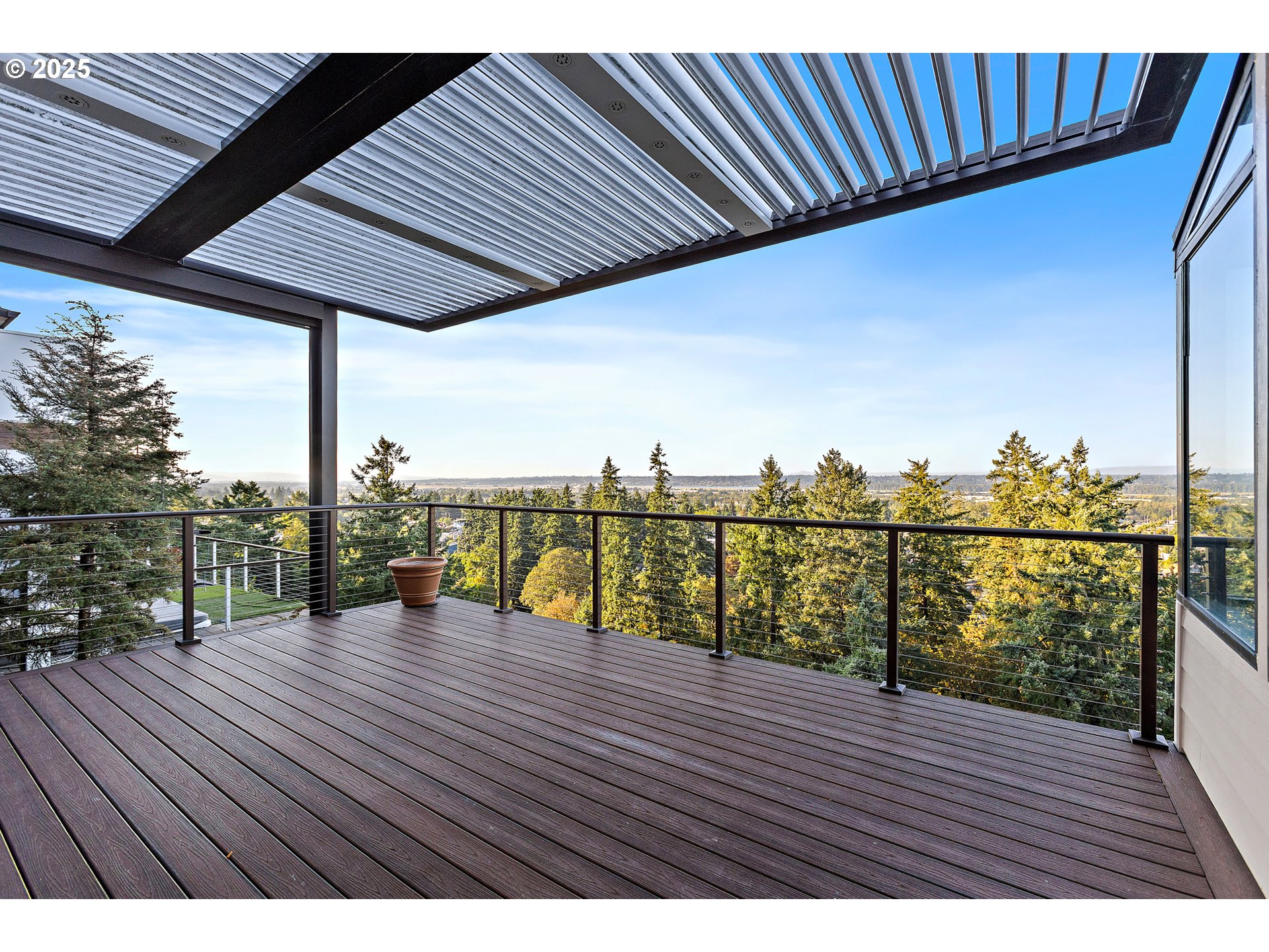 9101 Northeast Cliff Street Portland, OR 97220 - Photo 3 of 26 a view of outdoor space with wooden deck