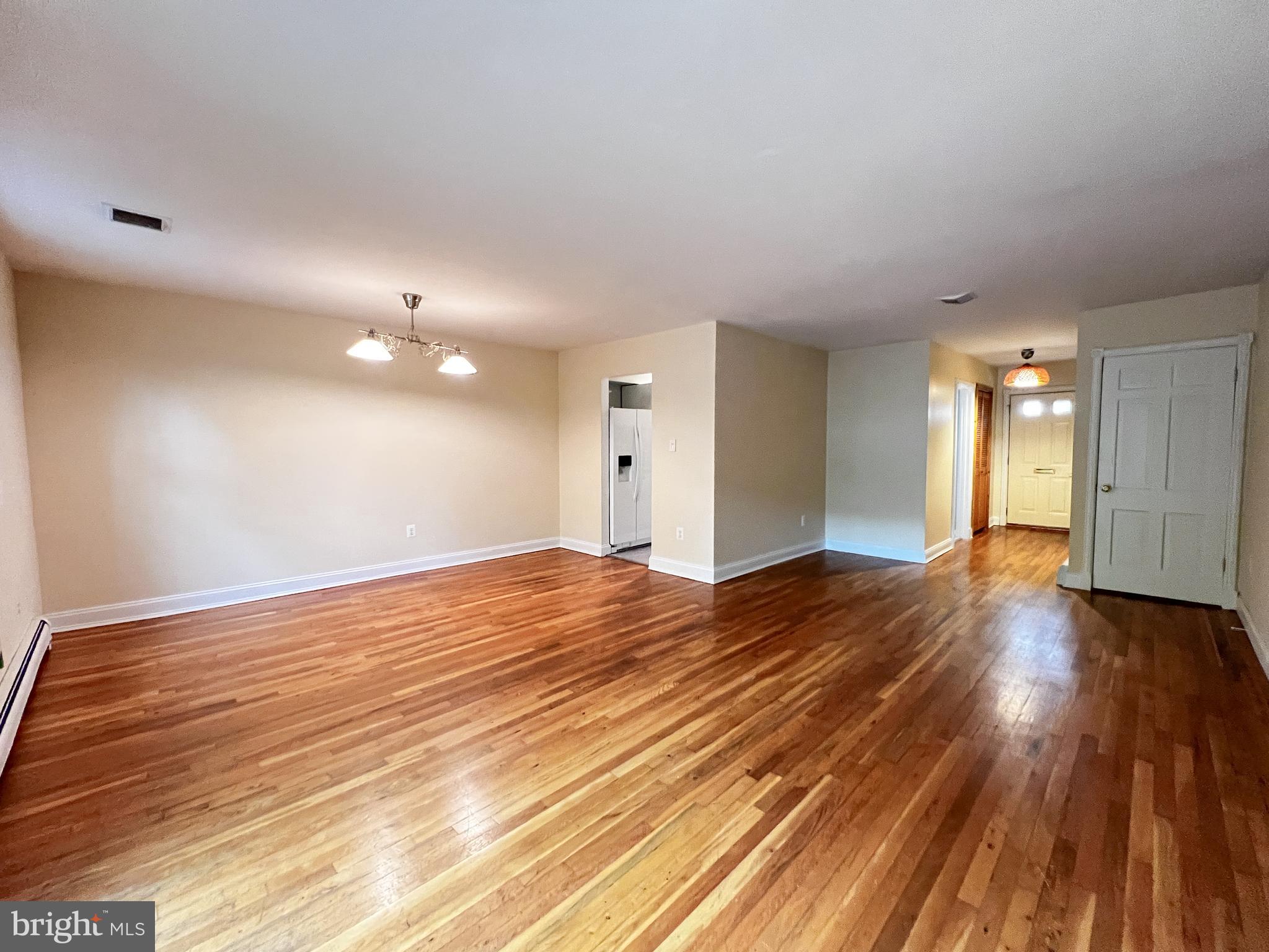 12824 Epping Terrace Silver Spring, MD 20906 - Photo 11 of 23 a view of an empty room and wooden floor