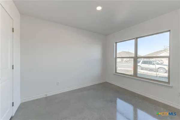 an empty room with a window