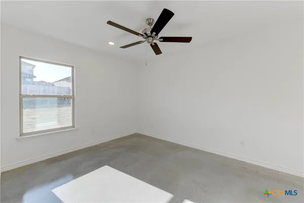 an empty room with a window