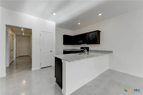 a view of kitchen with a sink