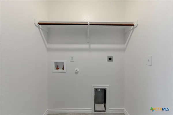 a view of small space with racks on the wall