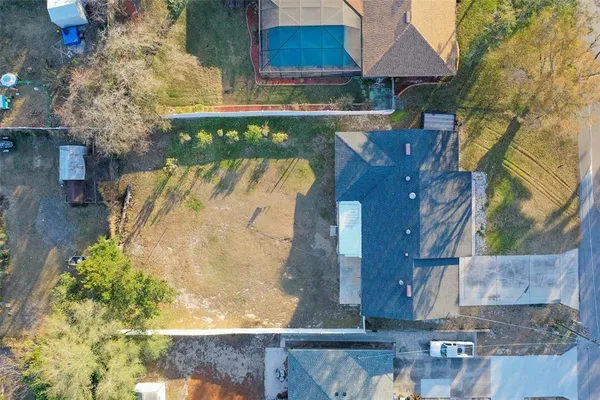 a view of yard with swimming pool