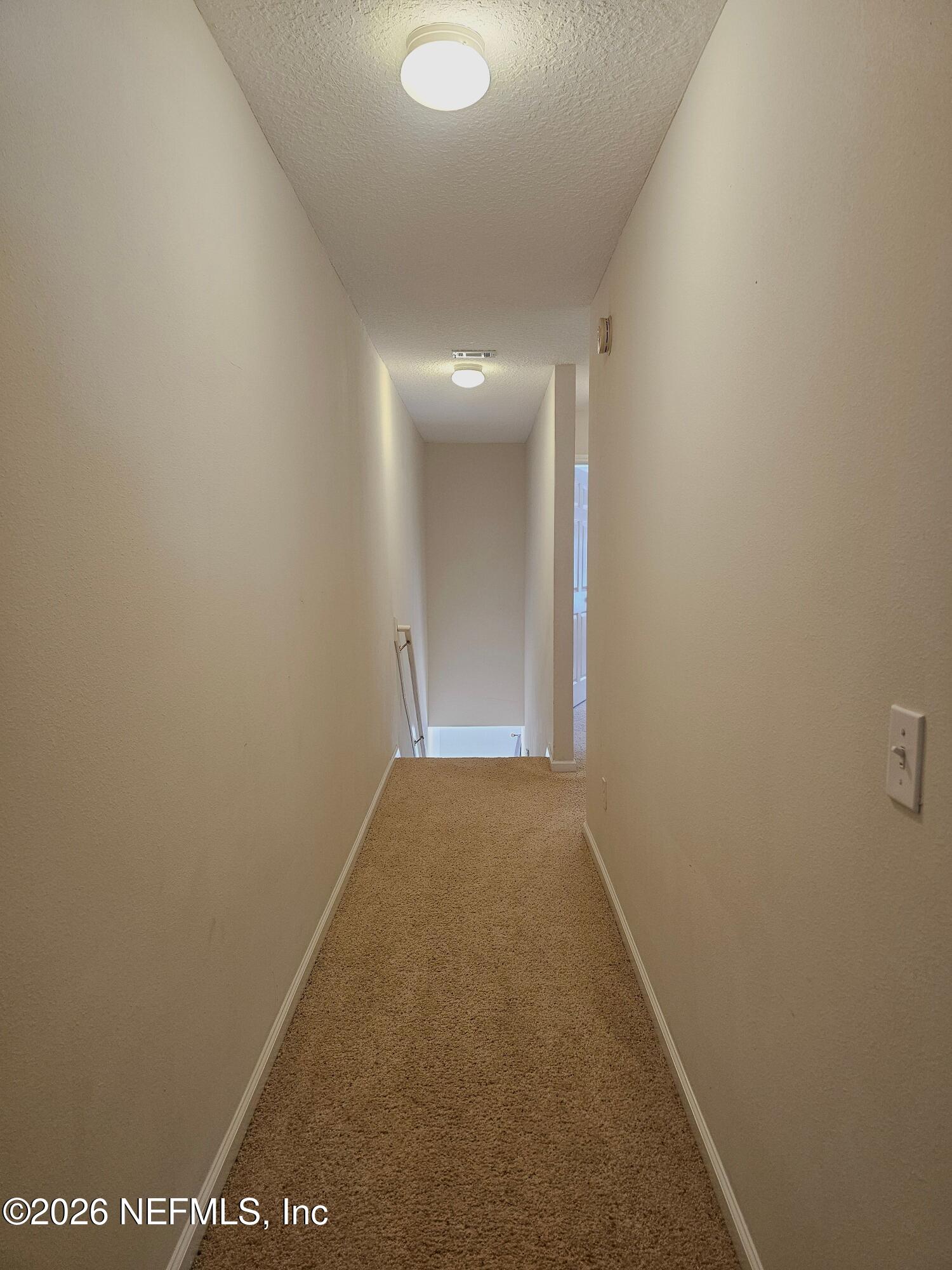 7826 Melvin Road Jacksonville, FL 32210 - Photo 17 of 17 a view of hallway