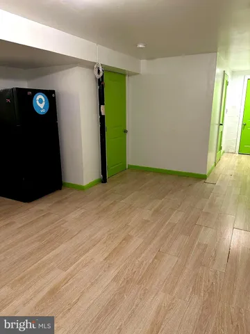 a view of room and wooden floor