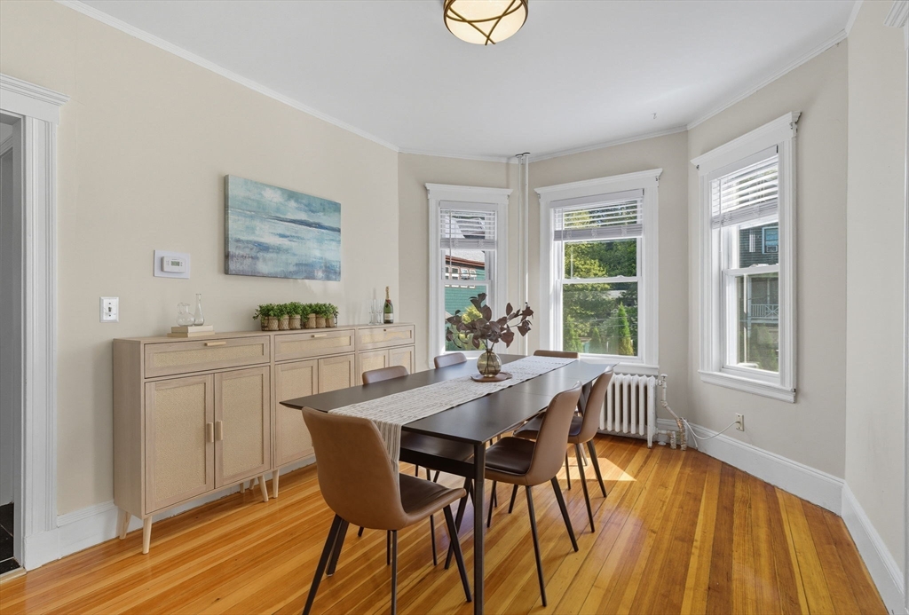 20 Rice Street, Unit 2 Brookline, MA 02445 - Photo 5 of 27 a dining room with furniture and window