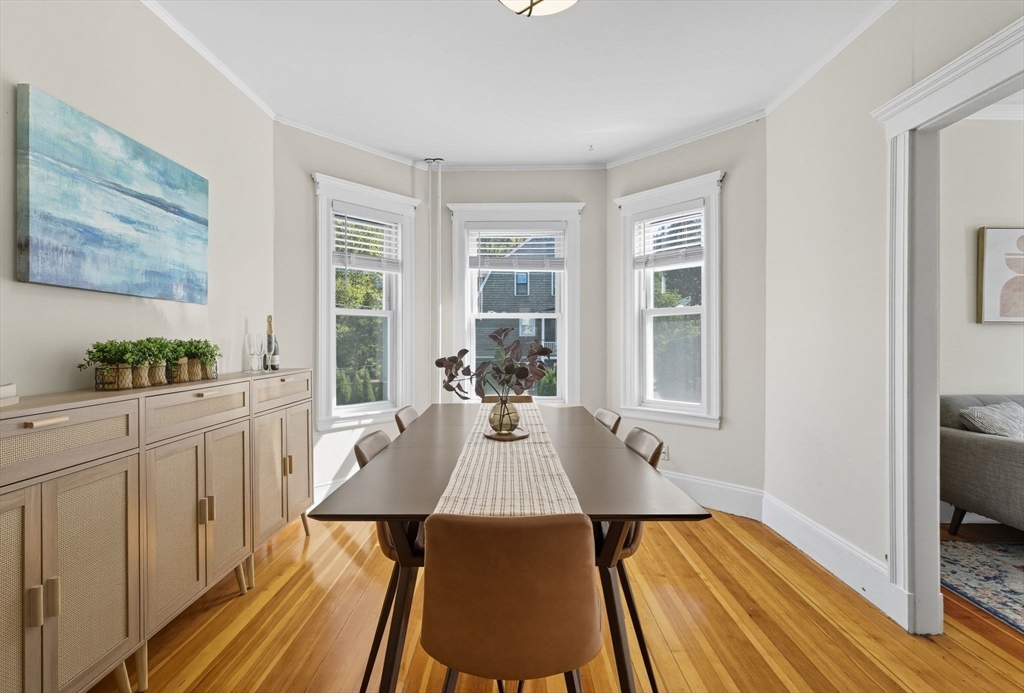 20 Rice Street, Unit 2 Brookline, MA 02445 - Photo 6 of 27 a view of a dining room with furniture window and wooden floor