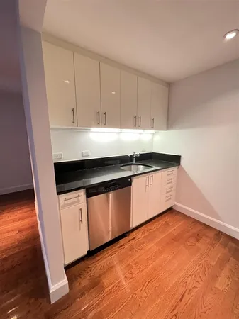 a utility room with washing machine