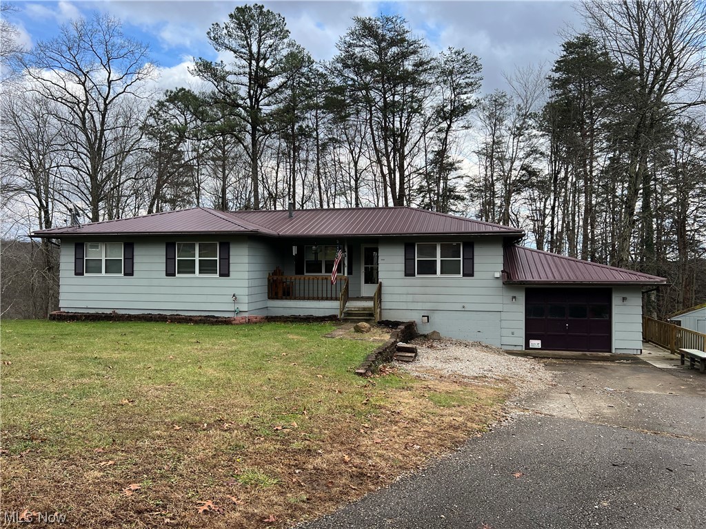 6950 Walker Road Walker, WV 26180 - Photo 1 of 22 Single story home featuring a front yard