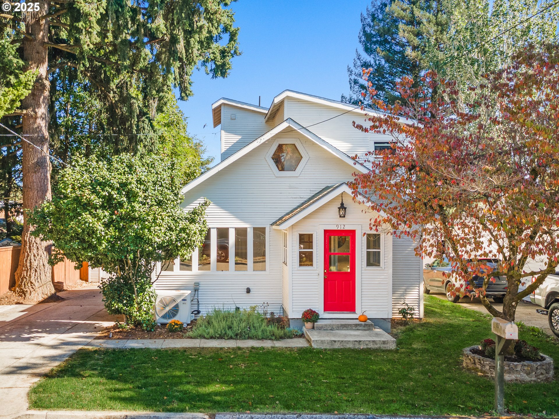 a front view of house with yard and entertaining space