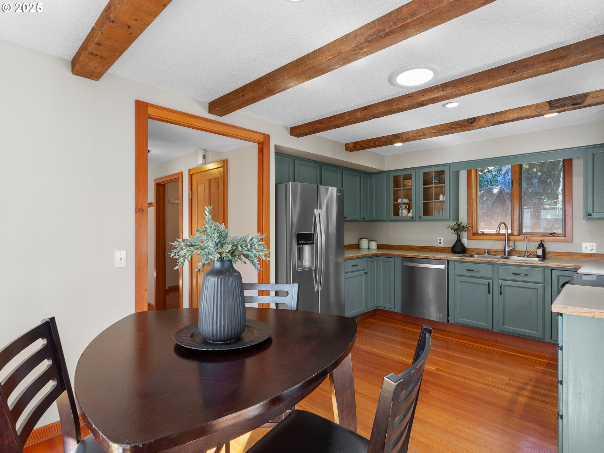 912 Northwest Fargo Street Camas, WA 98607 - Photo 15 of 44 a kitchen with a table and chairs in it