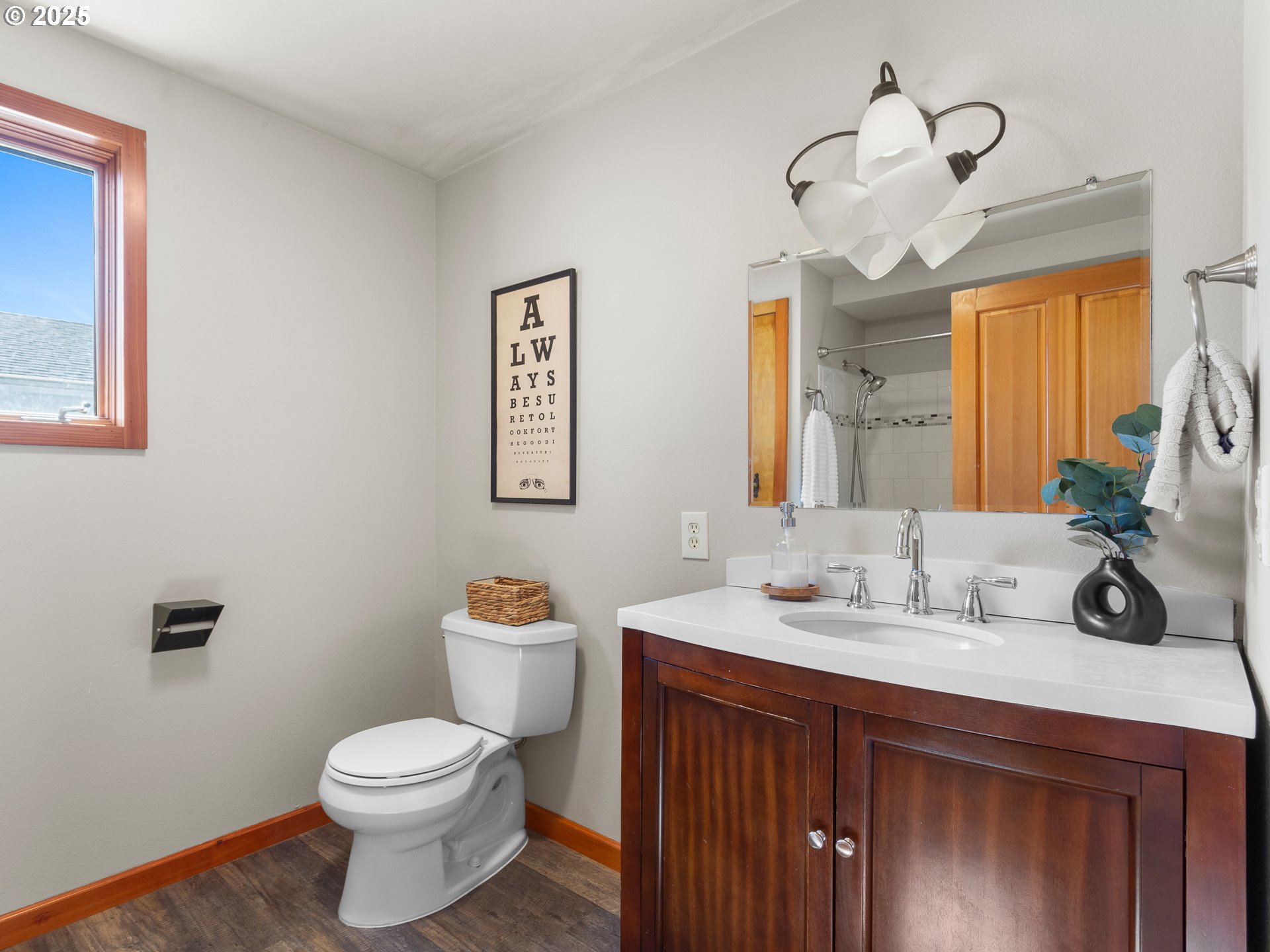912 Northwest Fargo Street Camas, WA 98607 - Photo 18 of 44 a bathroom with a toilet sink and mirror