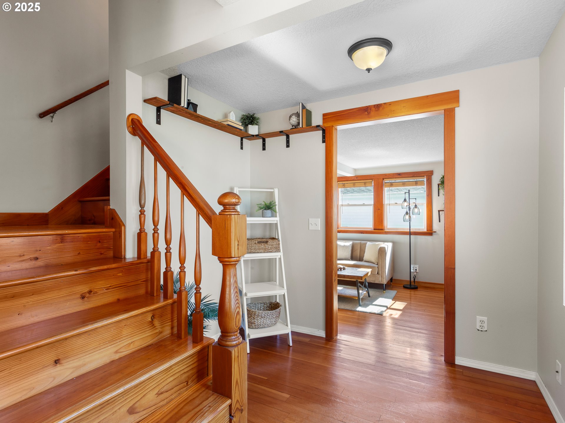 912 Northwest Fargo Street Camas, WA 98607 - Photo 20 of 44 a view of an entryway with wooden floor and a livingroom view