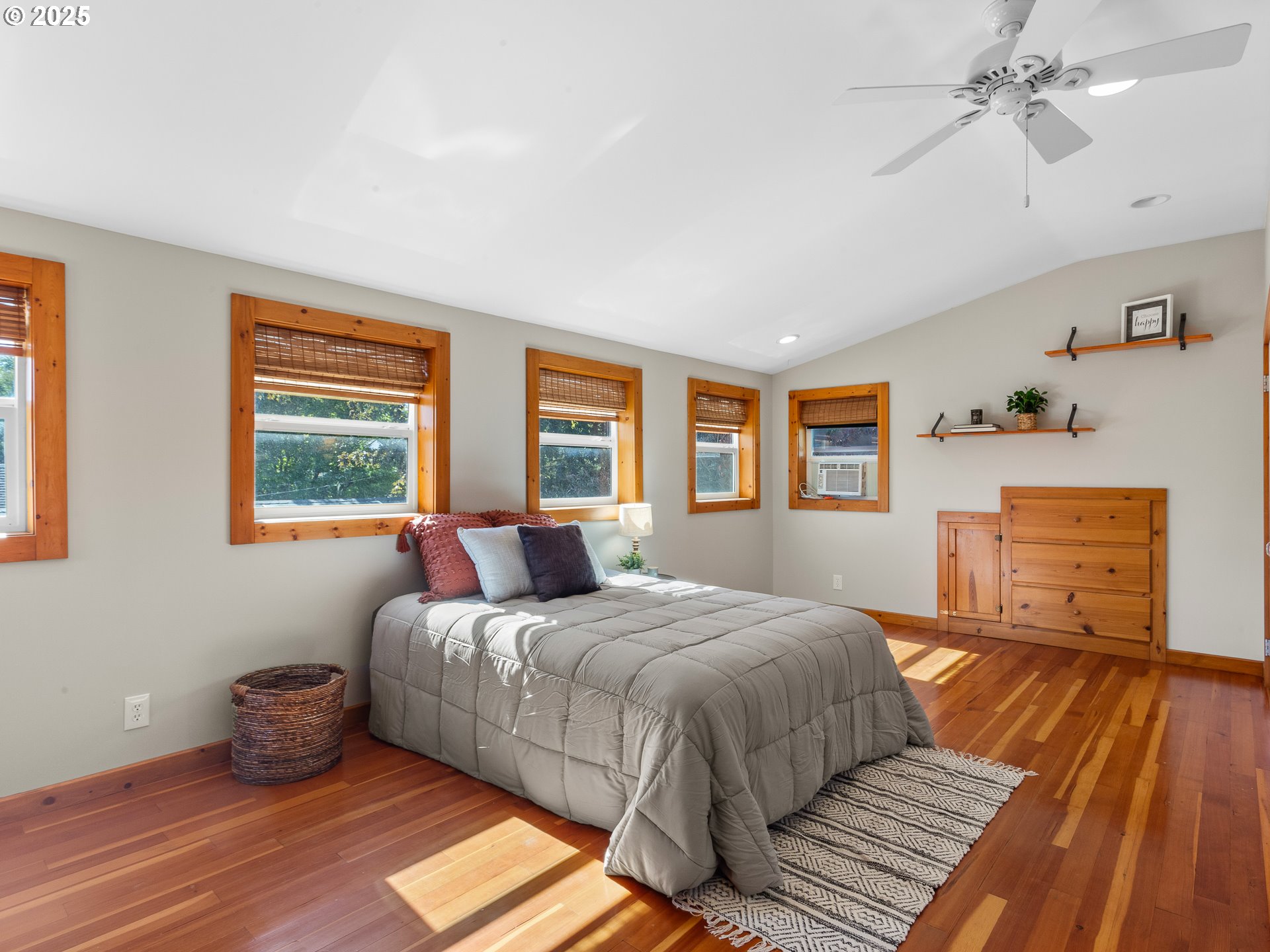 912 Northwest Fargo Street Camas, WA 98607 - Photo 24 of 44 a bedroom with a bed and wooden floor