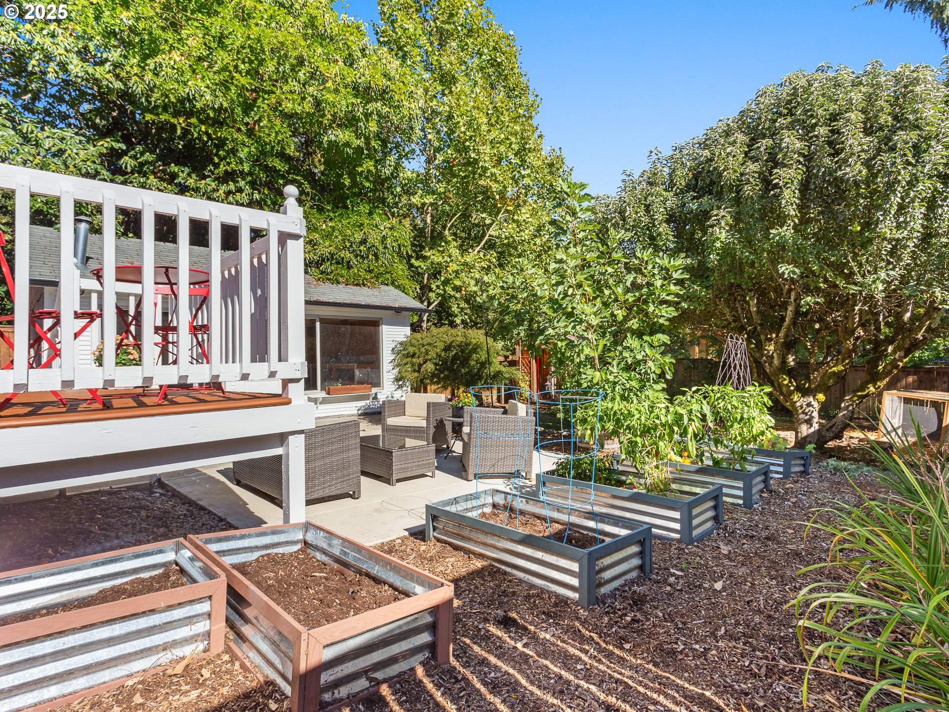 912 Northwest Fargo Street Camas, WA 98607 - Photo 32 of 44 a view of a chairs and tables in the back yard of the house