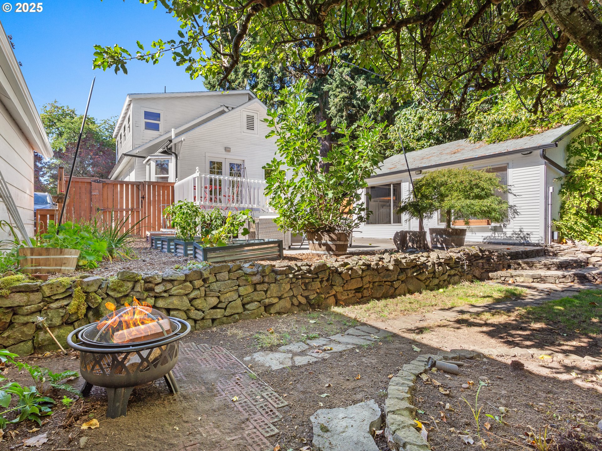 912 Northwest Fargo Street Camas, WA 98607 - Photo 34 of 44 a view of an house with backyard space and garden