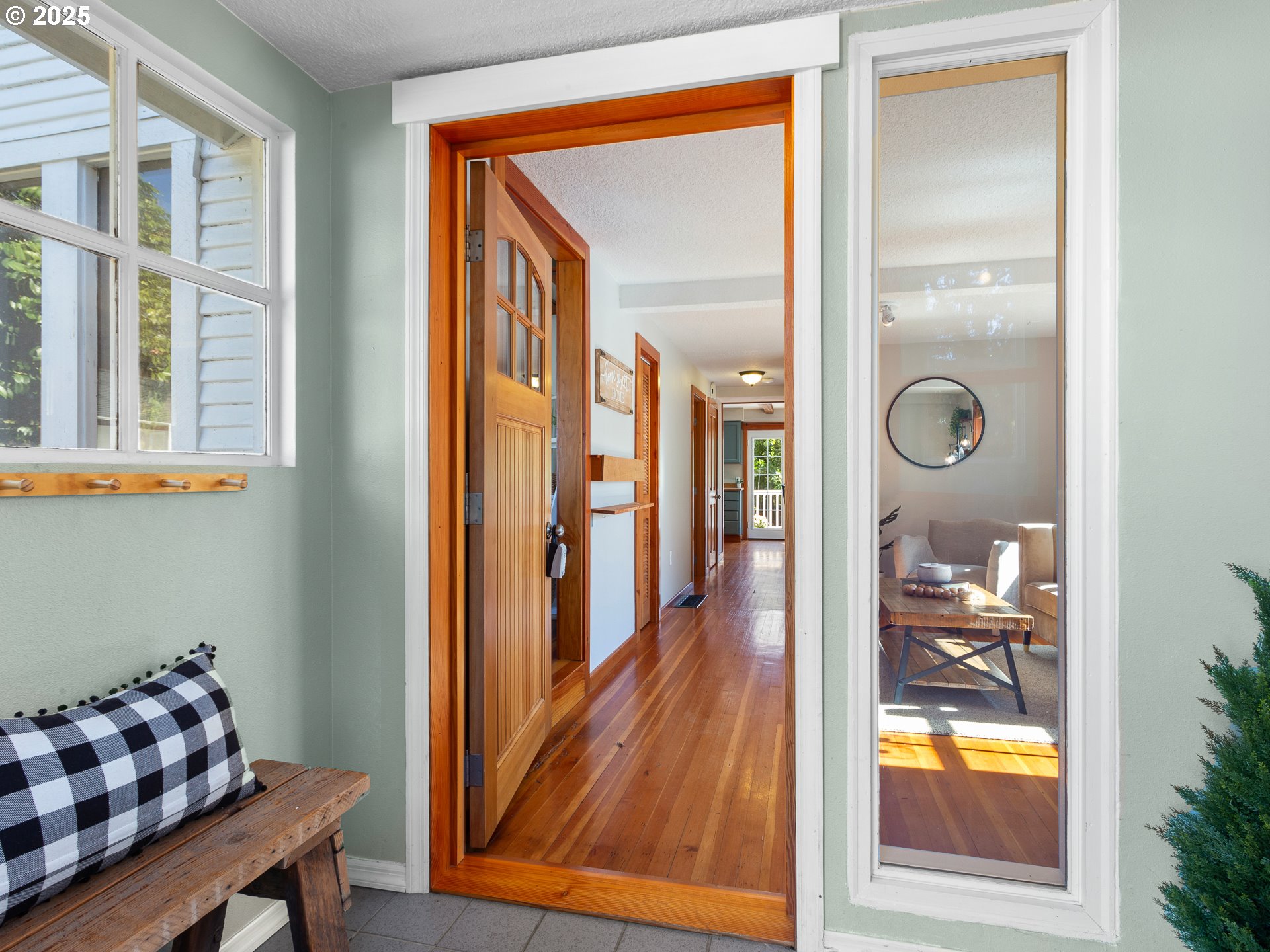 912 Northwest Fargo Street Camas, WA 98607 - Photo 6 of 44 a hallway with dining room and hallway with wooden floor
