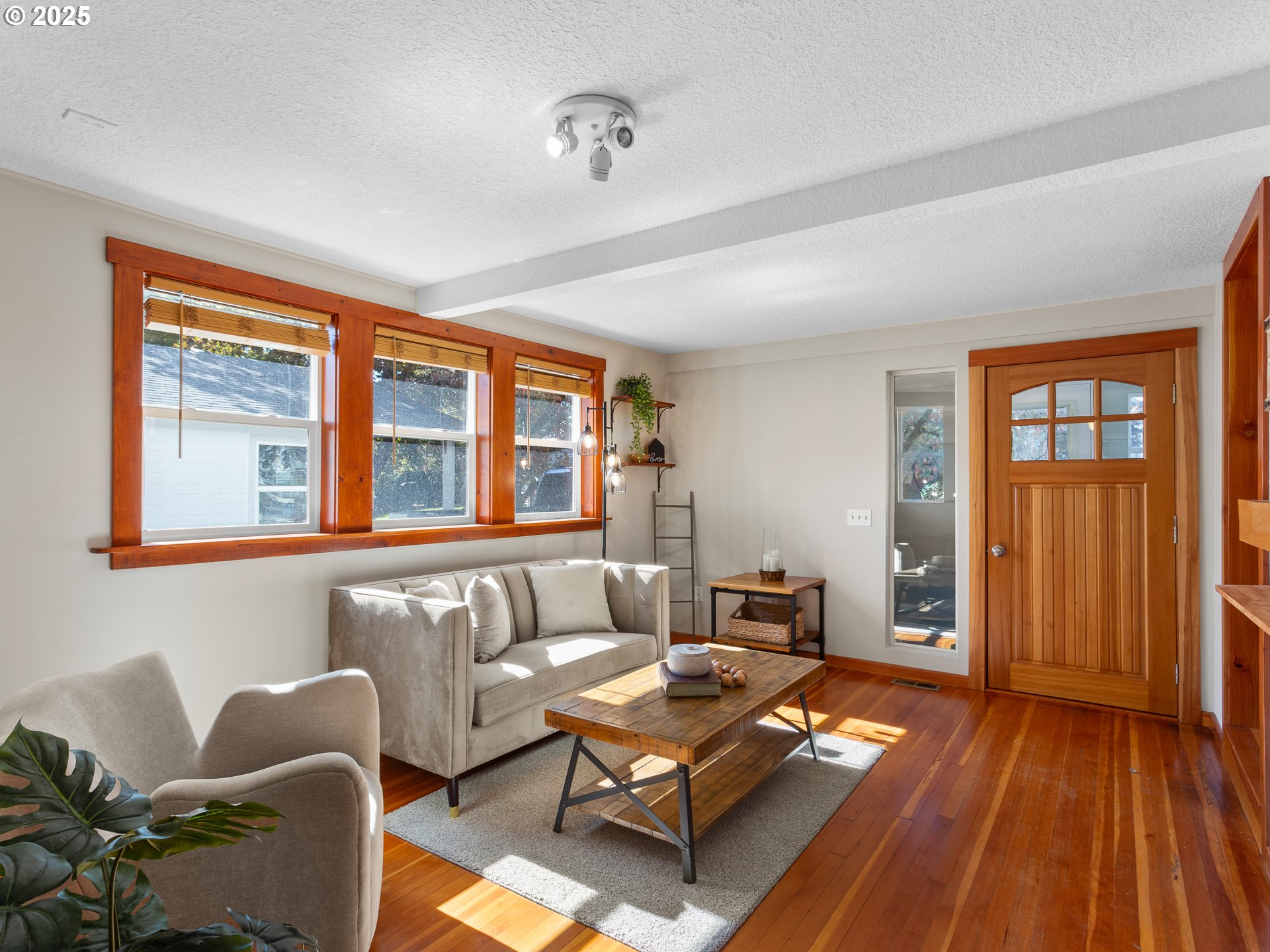 912 Northwest Fargo Street Camas, WA 98607 - Photo 9 of 44 a living room with furniture and wooden floor