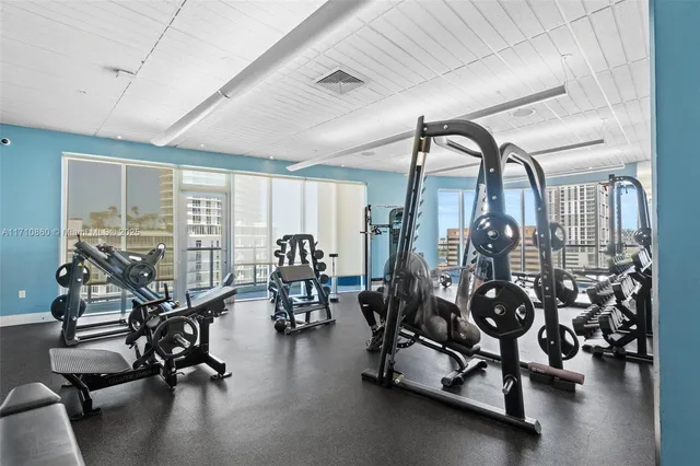 a view of swimming pool with chairs