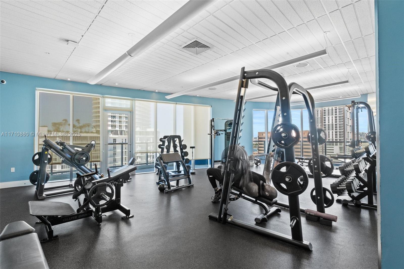 185 Southwest 7th Street, Unit 3111 Miami, FL 33130 - Photo 30 of 40 a view of a room with gym equipment