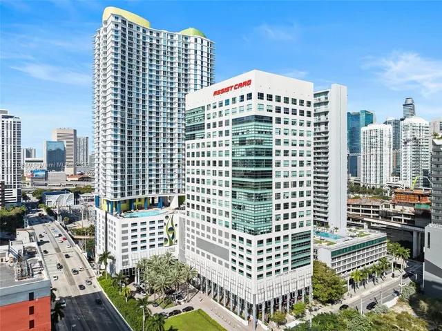 a view of outdoor space with palm trees