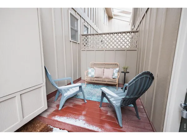 a room with furniture and wooden floor