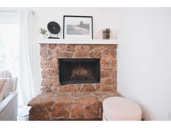 a living room with a fireplace