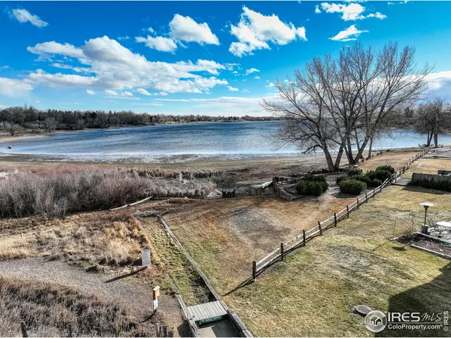 a view of a yard with an ocean