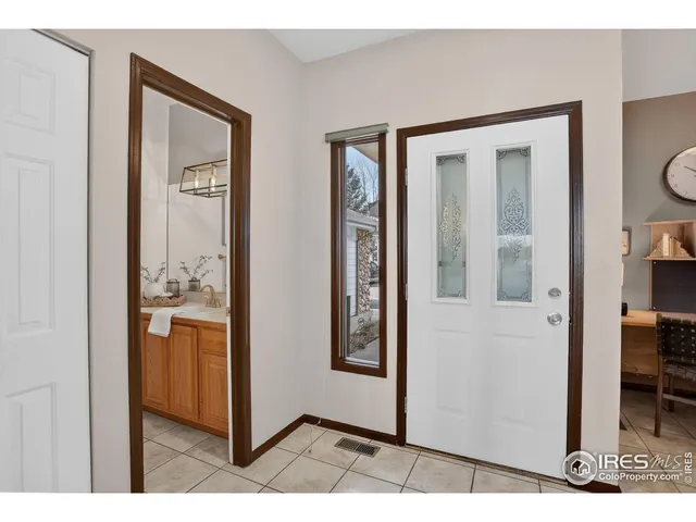 a view of a bathroom from the hallway