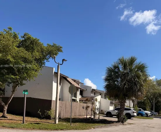 a front view of a building with street view