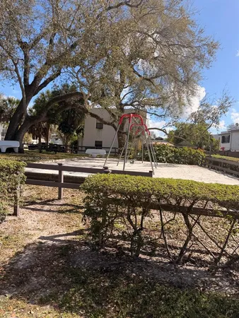 a view of a yard with a house