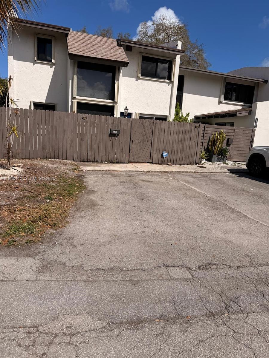 7101 Southwest 113th Court Miami, FL 33173 - Photo 3 of 30 front view of a house with a garage