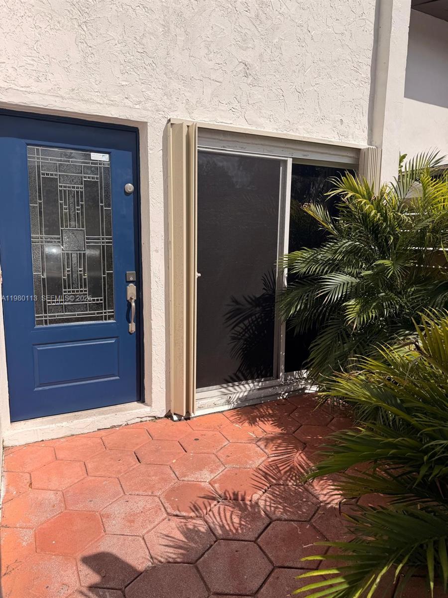 7101 Southwest 113th Court Miami, FL 33173 - Photo 4 of 30 a backyard of a house