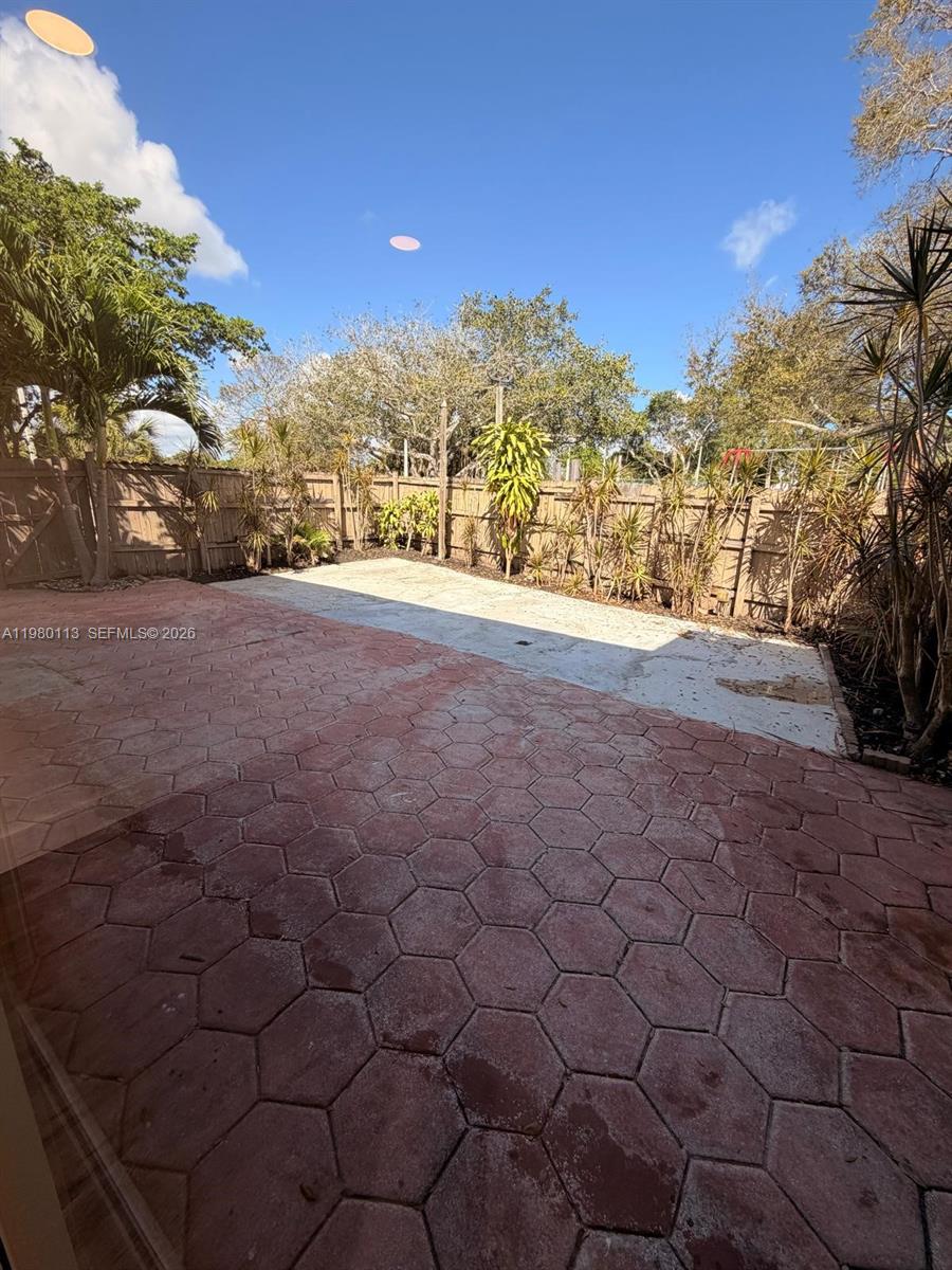7101 Southwest 113th Court Miami, FL 33173 - Photo 7 of 30 a view of large trees with a yard