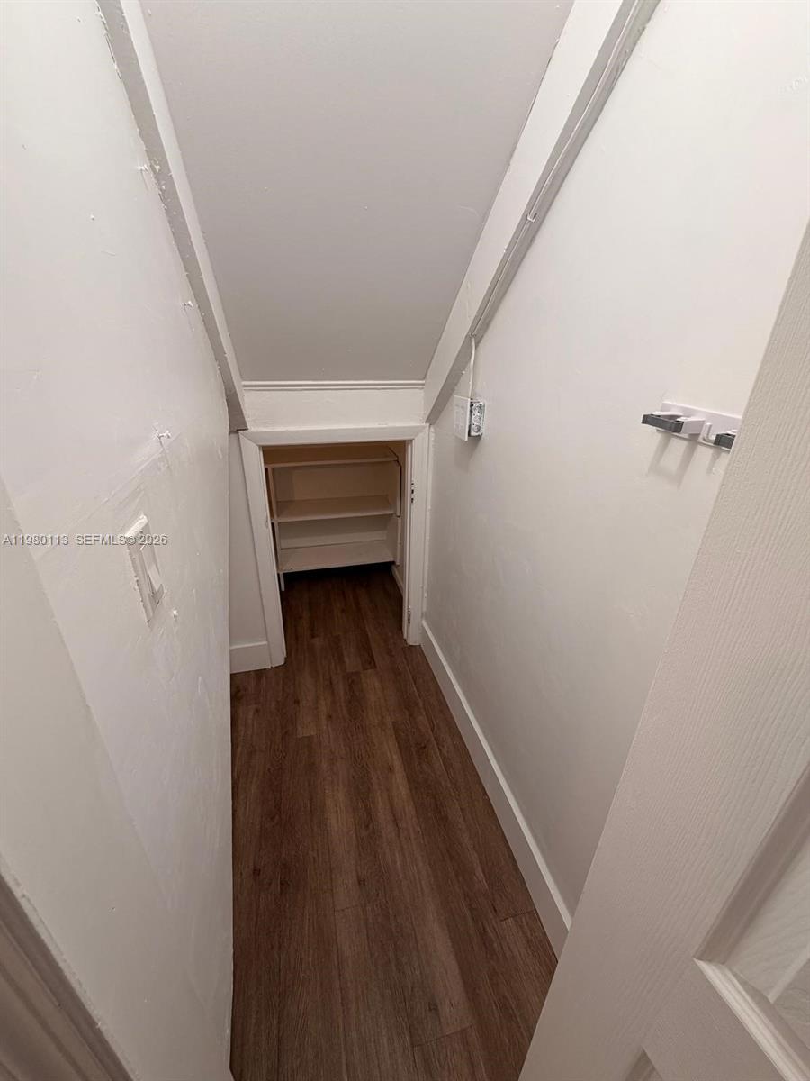7101 Southwest 113th Court Miami, FL 33173 - Photo 9 of 30 a view of entryway with wooden floor
