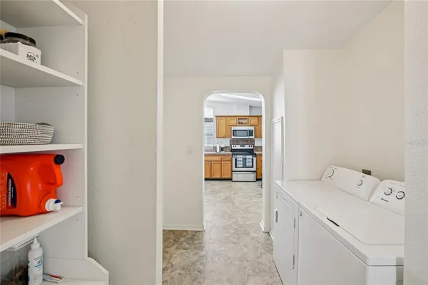 a utility room with dryer and washer