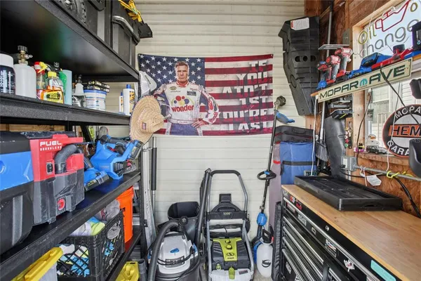 a living room with furniture and a rug