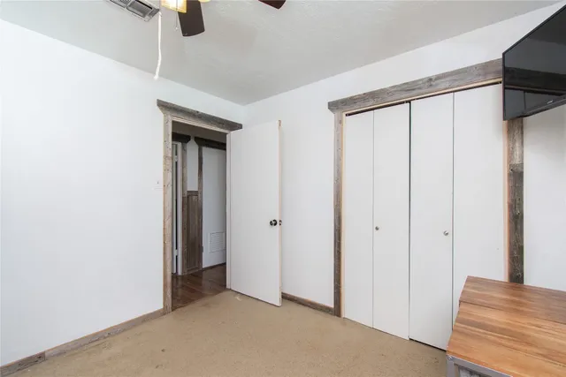 a view of a room with an entryway