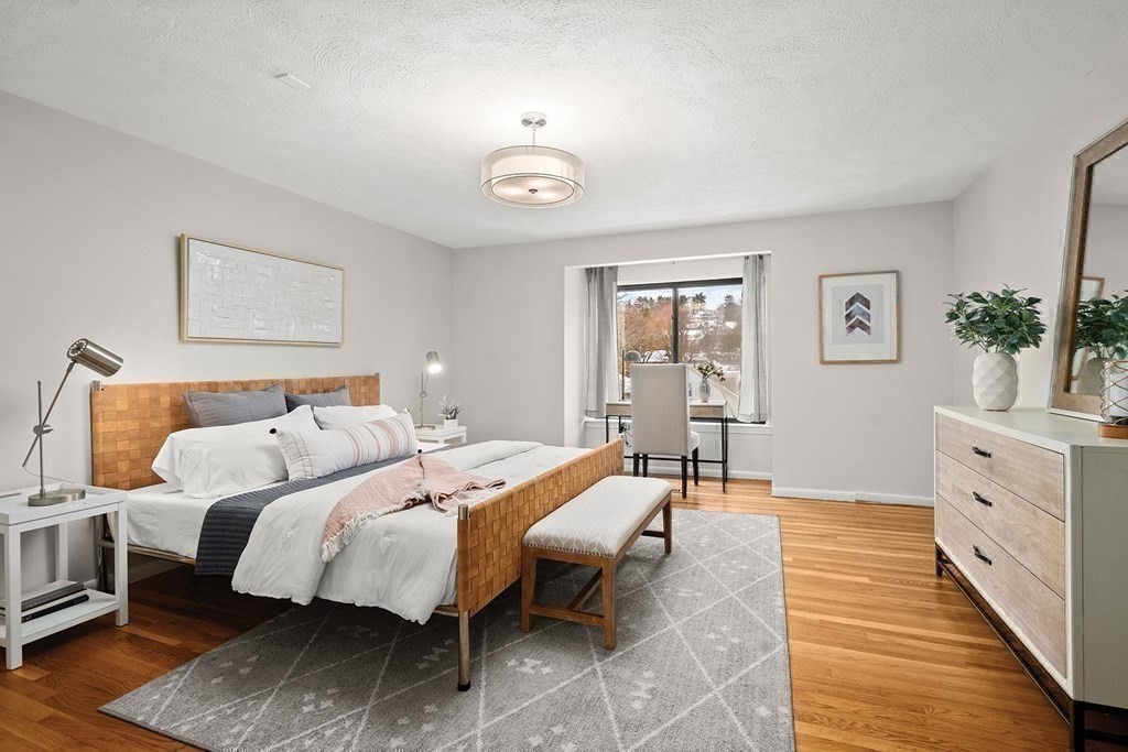 120 Beaconsfield Road, Unit 9 Brookline, MA 02445 - Photo 9 of 20 a bed room with bed and a window