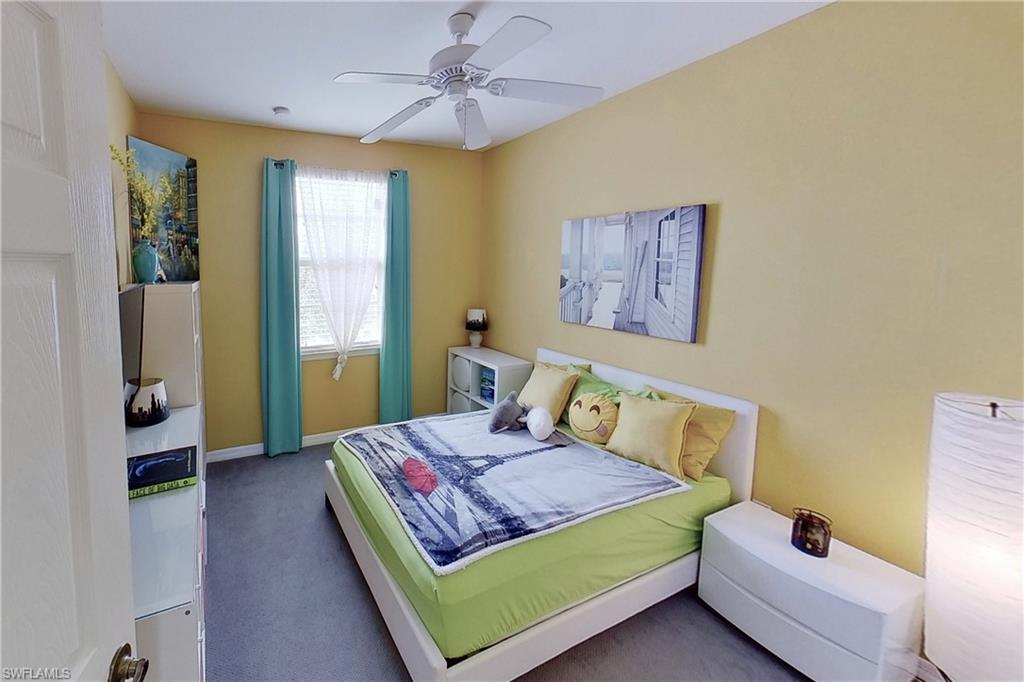 3970 Cherrybrook Loop Fort Myers, FL 33966 - Photo 11 of 21 a bedroom with a bed and window