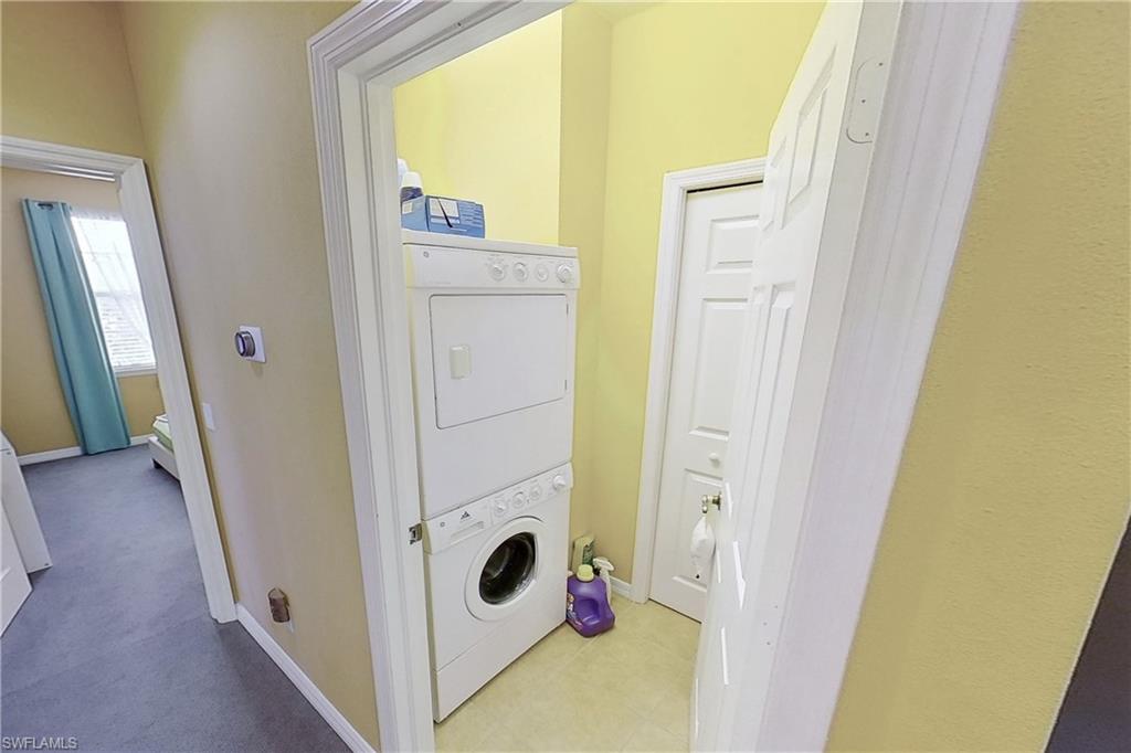 3970 Cherrybrook Loop Fort Myers, FL 33966 - Photo 12 of 21 a view of a hallway with washer and dryer