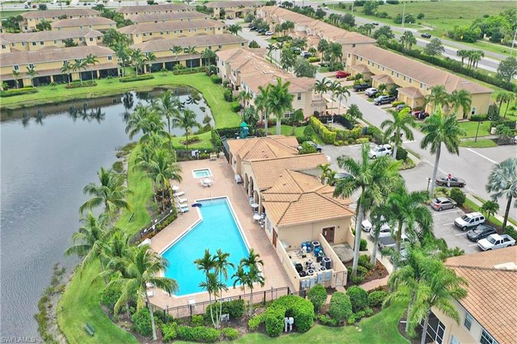 3970 Cherrybrook Loop Fort Myers, FL 33966 - Photo 20 of 21 an aerial view of residential houses with outdoor space and lake view