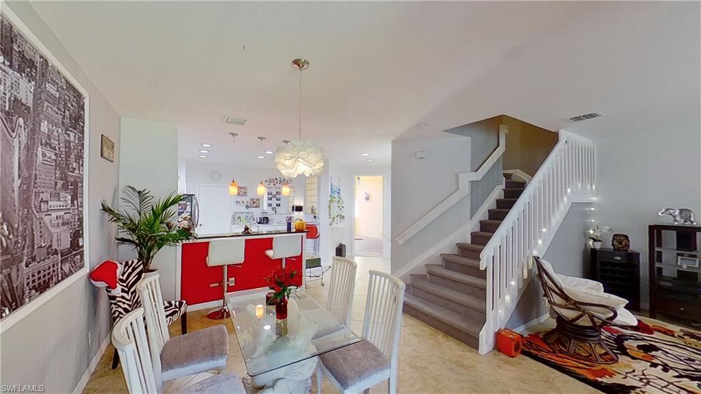 3970 Cherrybrook Loop Fort Myers, FL 33966 - Photo 7 of 21 a living room with furniture and wooden floor