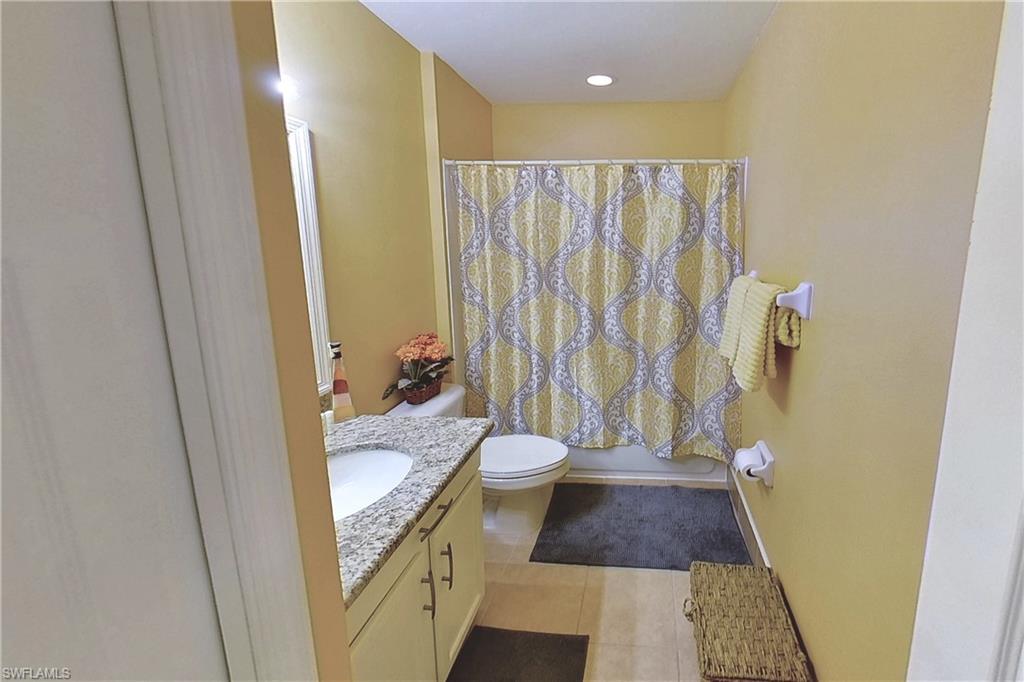 3970 Cherrybrook Loop Fort Myers, FL 33966 - Photo 10 of 21 a bathroom with a granite countertop shower and a sink