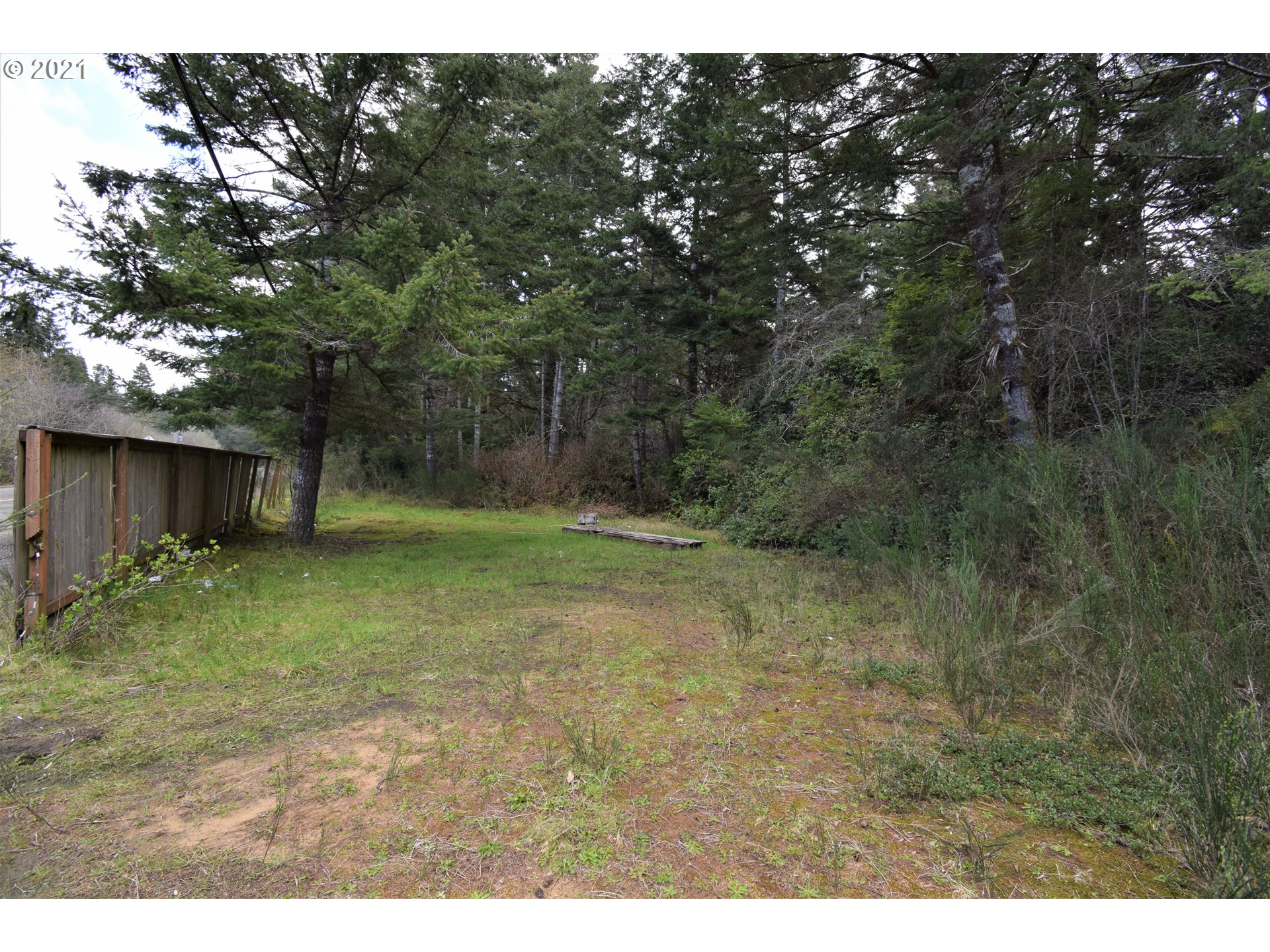 67071 Spinreel Road North Bend, OR 97459 - Photo 1 of 13 a view of a backyard
