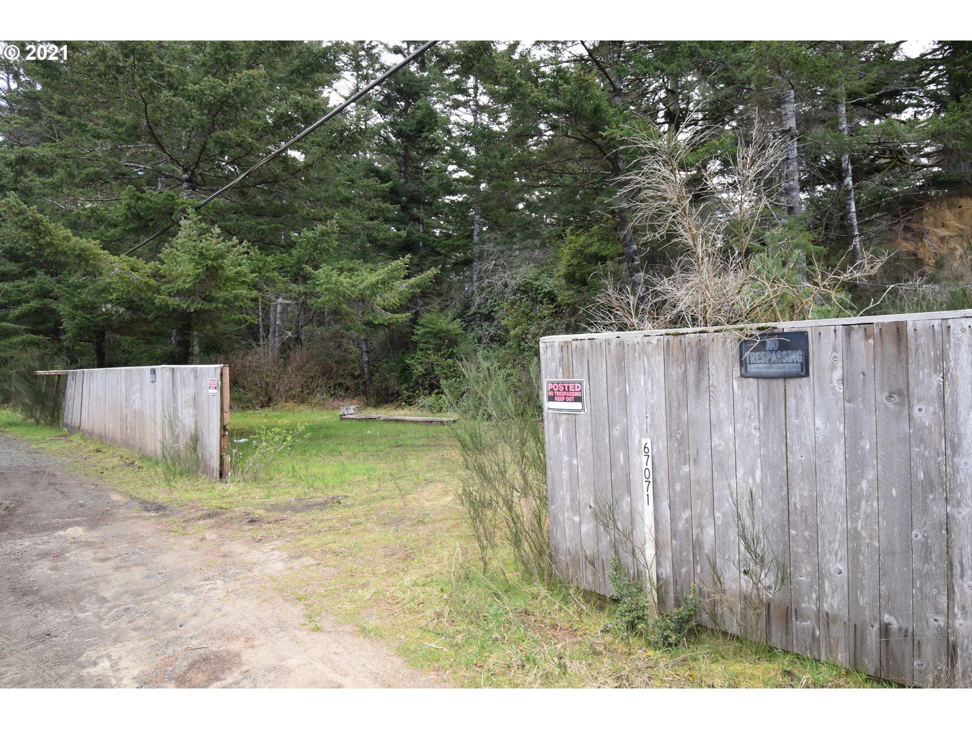 67071 Spinreel Road North Bend, OR 97459 - Photo 2 of 13 a view of a backyard