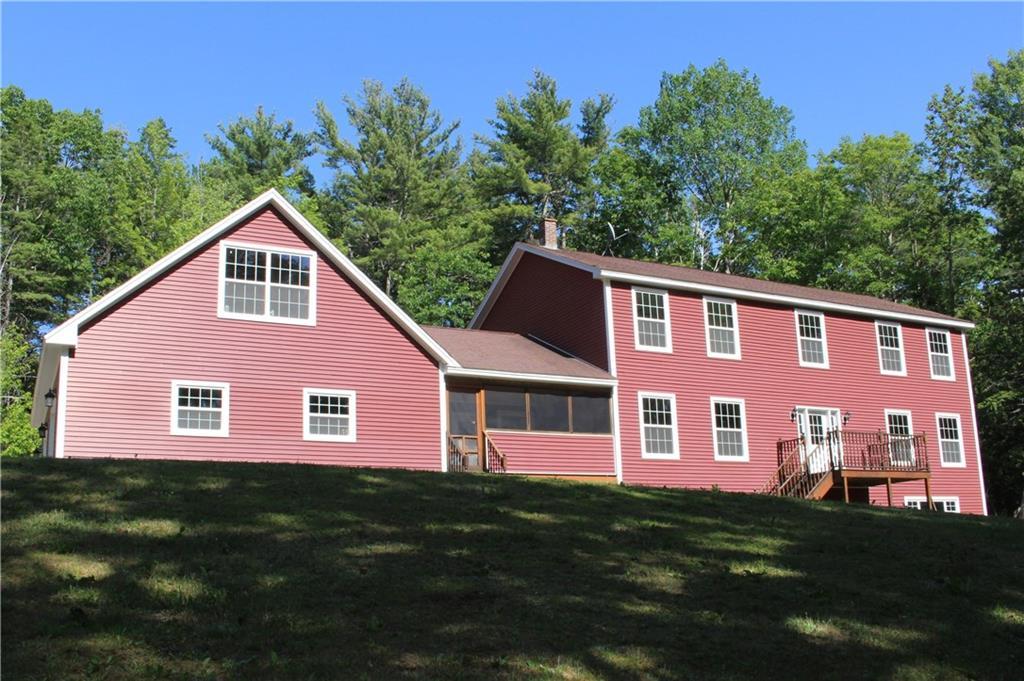 This Hermon home is surrounded by...