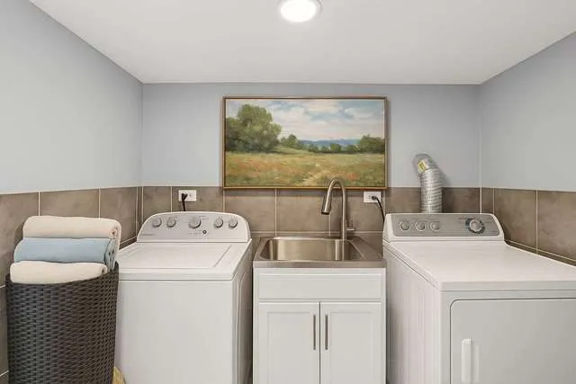 a utility room with dryer and washer