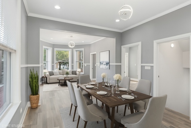 642 East 90th Street Chicago, IL 60619 - Photo 4 of 13 a view of a dining room with furniture and wooden floor
