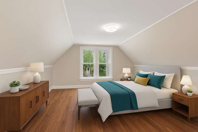 642 East 90th Street Chicago, IL 60619 - Photo 6 of 13 a bedroom with a bed and window